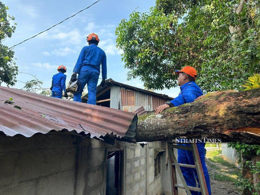 Strong winds damaged 23 houses in the subdistricts of Siong, Tawar, Pulai , Bakai and Teloi Kanan in Baling yesterday.Pic courtesy of Kedah Malaysian Civil Defence Force