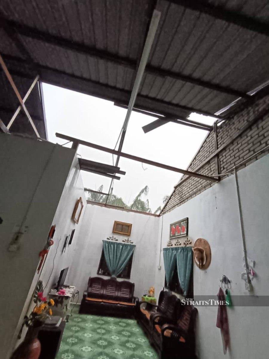 Strong winds damaged 23 houses in the subdistricts of Siong, Tawar, Pulai , Bakai and Teloi Kanan in Baling yesterday.Pic courtesy of Kedah Malaysian Civil Defence Force