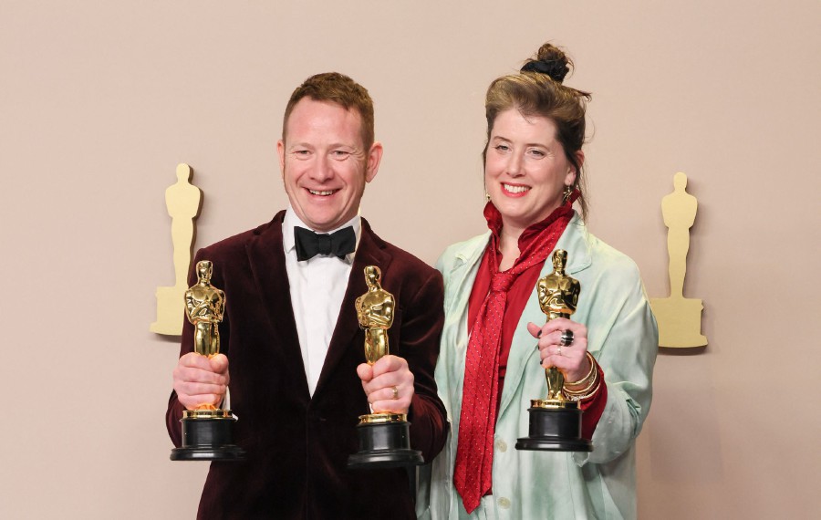 (L-R) James Price and Shona Heath, winners of the Best Production Design award for ‘Poor Things’, pose in the press room during the 96th Annual Academy Awards at Ovation Hollywood in Hollywood, California. - AFP PIC