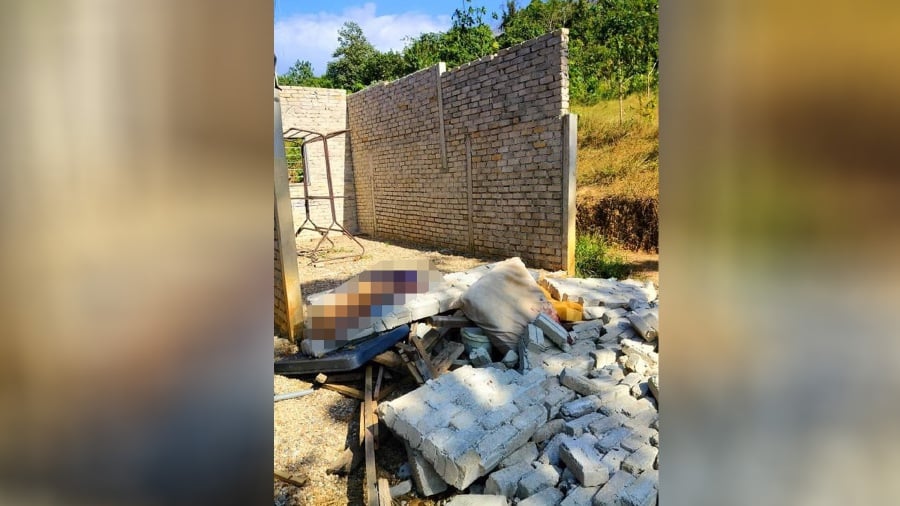 An eight-year-old boy died after a brick wall fell on him in Kampung Padang Lalang Besah, Mukim Tawar, Kuala Ketil, yesterday.- Pic courtesy readers