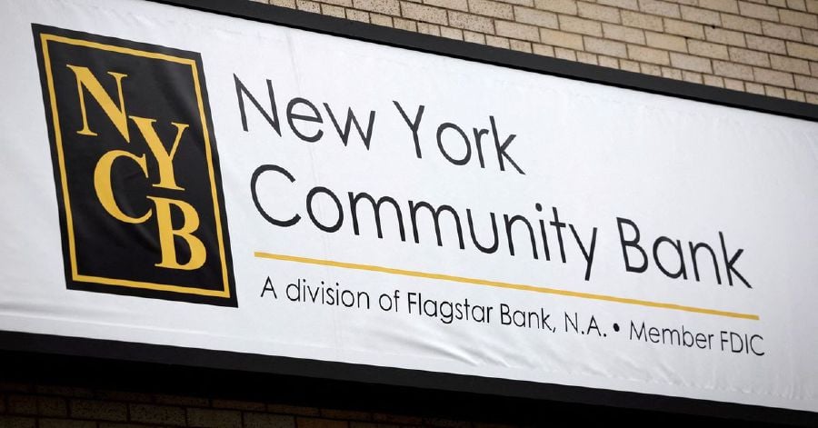 A sign is pictured above a branch of the New York Community Bank in Yonkers, New York, U.S., January 31, 2024. REUTERS/Mike Segar/File Photo 