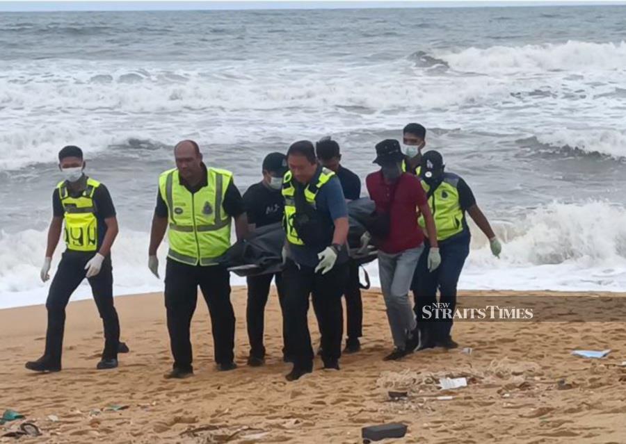 A somber discovery unfolded at the Rantau Abang beach as visitors were shocked to find a human body washed ashore in the evening today. - NSTP/ ROSLI ILHAM
