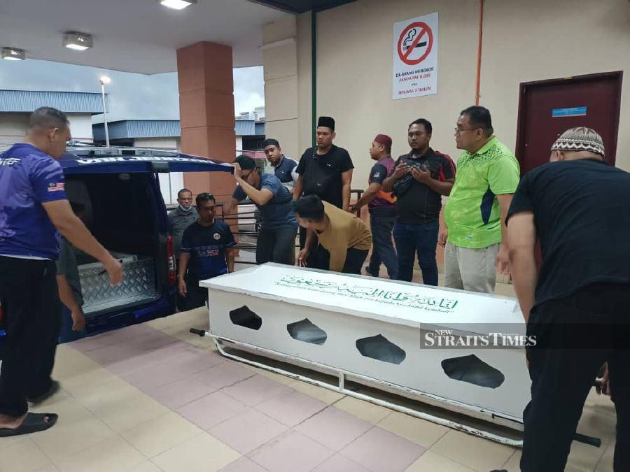 The teenager is laid to rest at the Kampung Kepayang Luar Muslim Cemetery. - Courtesy pic