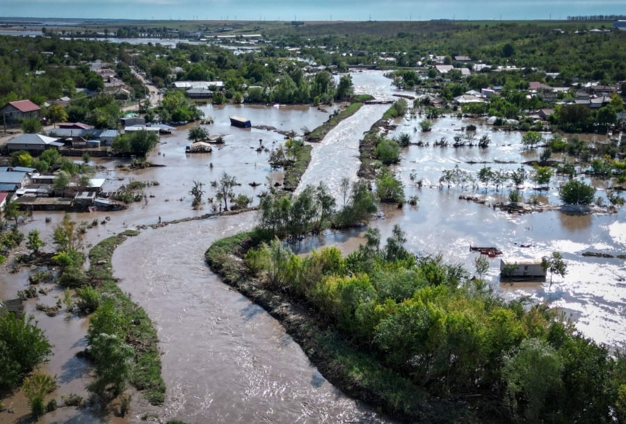 Aerial view of the rising flood waters due to Storm Boris in the Romanian village of Slobozia Conachi on Saturday. - AFP PIC