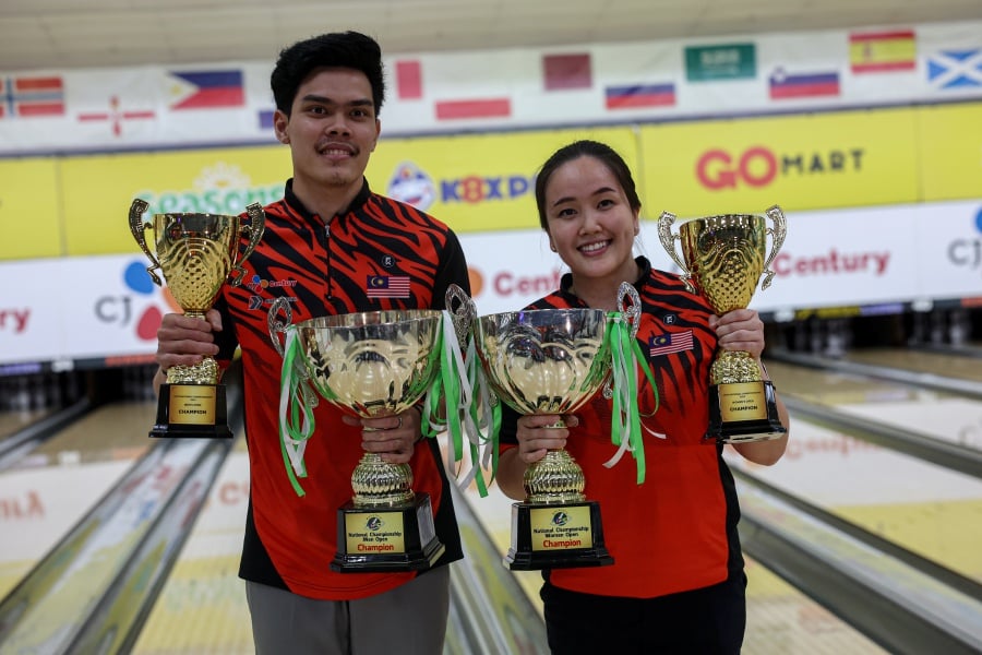 Bowlers Syazirol Shamsuddin and Sin Li Jane emerged as the men's and women's Open champions at the National Championships on Thursday. - Bernama pic