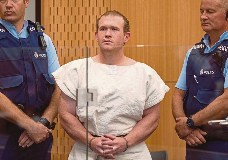  Brenton Tarrant, charged for murder in relation to the mosque attacks, is seen in the dock during his appearance in the Christchurch District Court, New Zealand March 16, 2019. - REUTERS PIC
