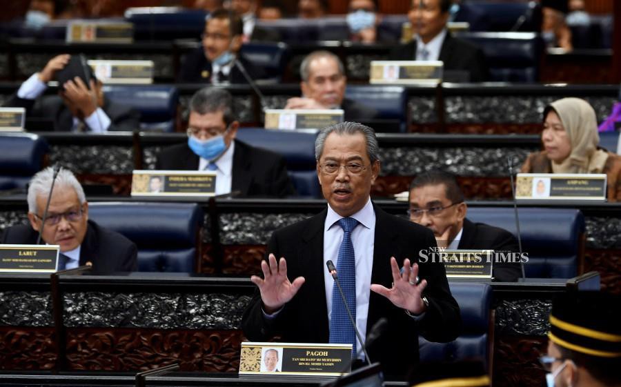 Prime Minister Tan Sri Muhyiddin Yassin during a question-and-answer session of the House of Representatives at the Second Meeting of the Third Term of the 14th Parliament at the Parliament. Bernama Photo