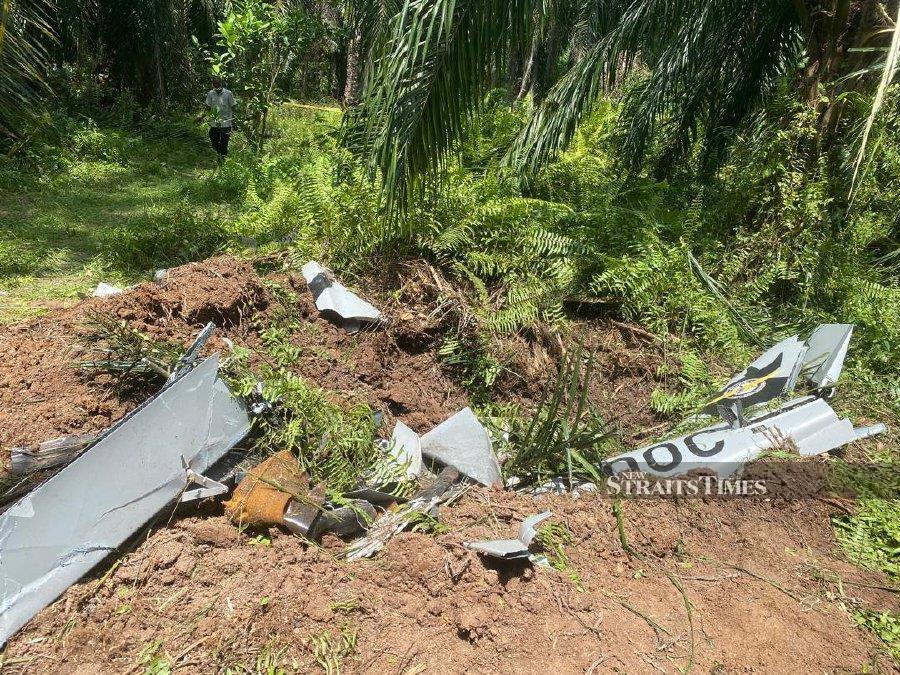  The police said that 45 per cent of the light aircraft which crashed at an oil palm plantation in Kapar was submerged in the ground. - Pic courtesy of Selangor Fire and Rescue Dept