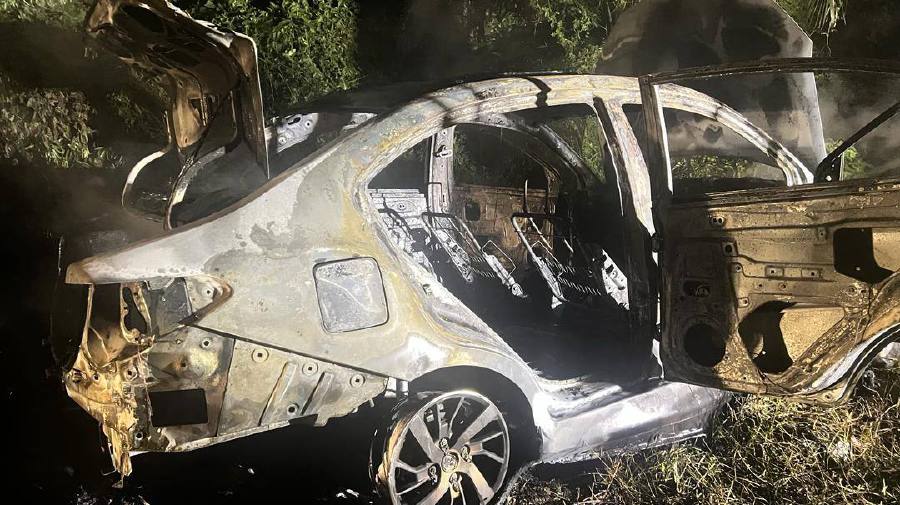 The badly burnt wreckage of the car.- Courtesy pic Bomba