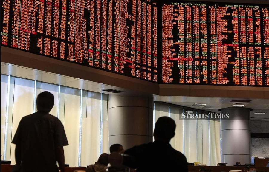 Bursa Malaysia opened marginally lower before inching into positive territory on Thursday, after the US Federal Reserve (Fed) maintained its key interest rates.