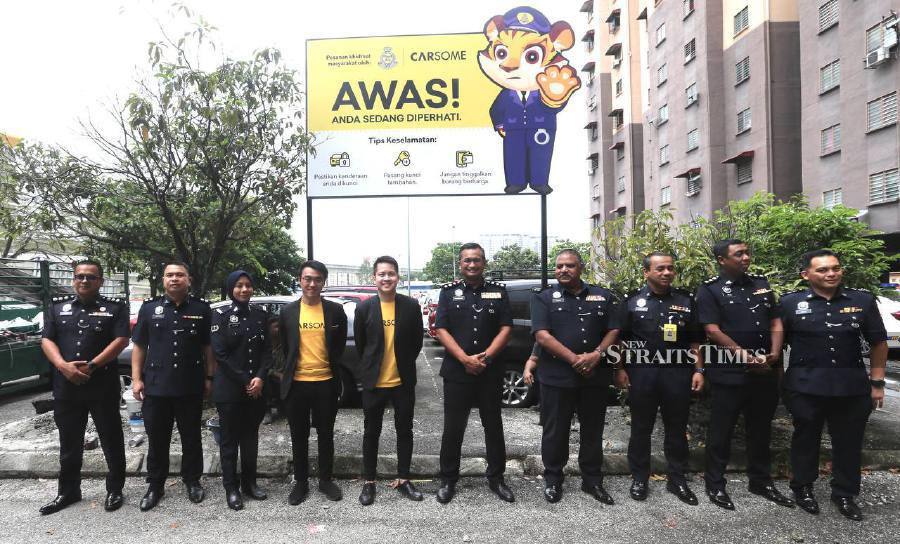 CarSome and Petaling Jaya police today launched a vehicle theft signage campaign to raise awareness on vehicle theft. - NSTP/AMIRUDIN SAHIB