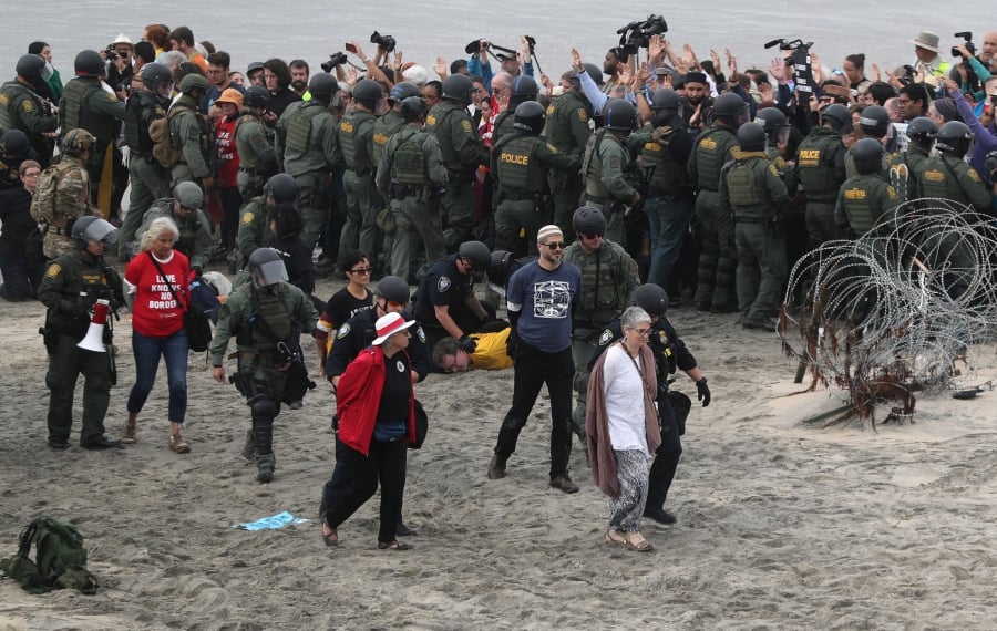 U.S. Agents Arrest 32 At Border Protest In San Diego | New Straits ...