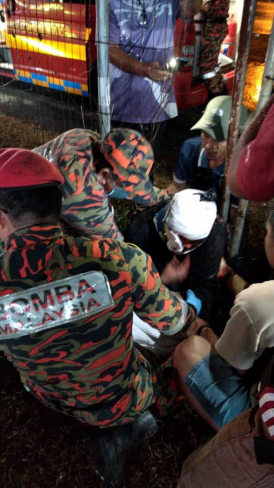 A couple riding the 'Octopus Ride' at a funfair suffered injuries when they were thrown off the ride near the Likas Sports Complex last night.- Courtesy pic (Bomba)