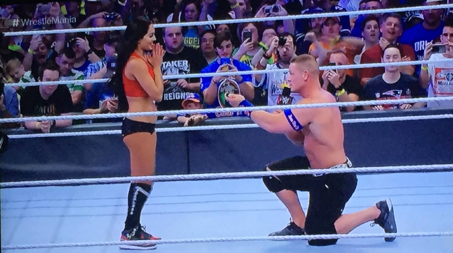  John Cena (right) proposes to Nikki Bella after their match with The Miz and Marse. Pix source: Twitter/@LanaWWE 