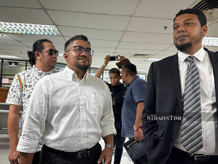 Bersatu information committee member Badrul Hisham Shaharin, better known as Chegubard, arrives at the Johor Baru court complex to face more charges. - NSTP/NUR AISYAH MAZALAN