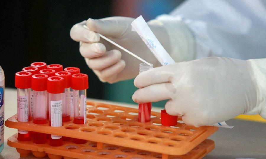 Domestic outbreaks have largely been eliminated, but as China logged a fifth straight day of new cases – mostly in northern and northwestern areas – authorities beefed up coronavirus controls. - AFP FILE PIC
