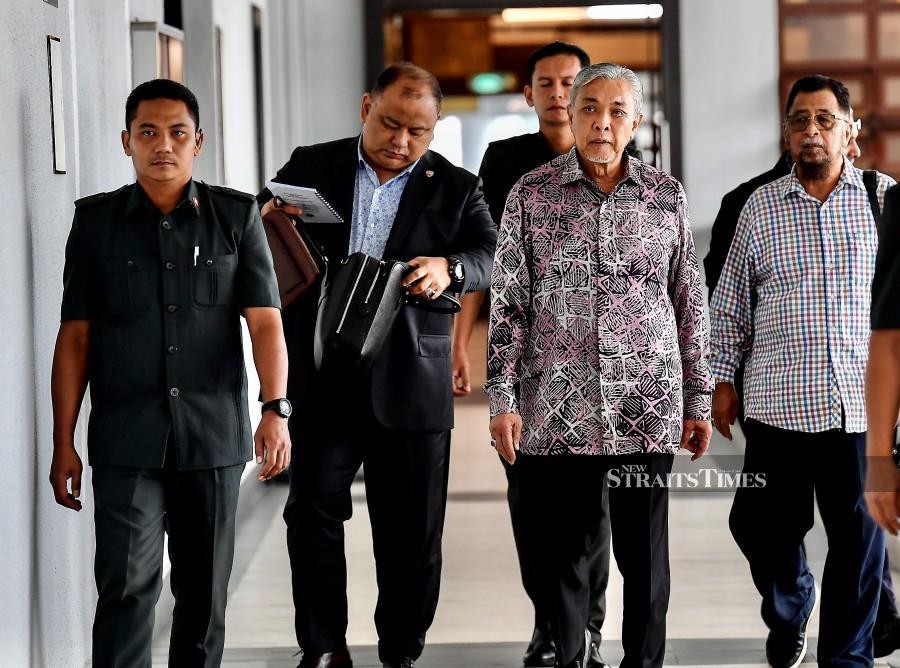 Deputy Prime Minister Datuk Seri Ahmad Zahid Hamidi arrives at the Kuala Lumpur Courts Complex ahead of the trial. -NSTP/FATHIL ASRI.
