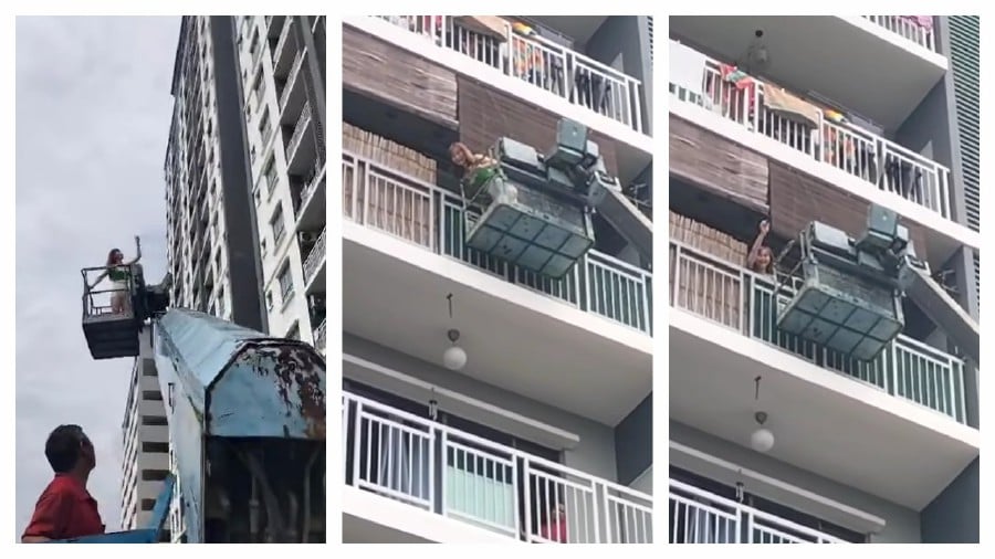 Tammy Ng, a singer and performer based in Selangor, who was locked out of her home due to a malfunctioned electronic door lock, opted for an unconventional solution: Hire a crane. - Screengrab via Facebook/Tammy Kin Nee