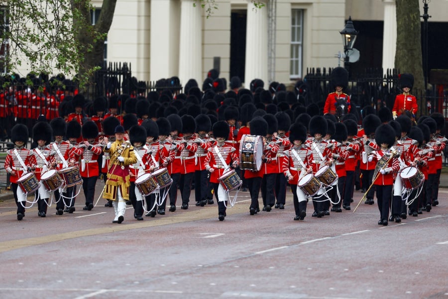 Crowds gather in London for moment in history as King Charles is ...