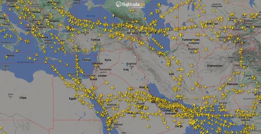 FILE PHOTO: A graphical representation of air traffic shows airspace over Iran and the neighbouring Middle East at 0000 GMT, April 14, 2024. Flightradar24.Com via REUTERS 