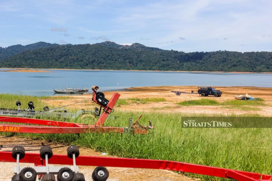 The Muda Agricultural Development Authority says water levels at its three dams, such as the Pedu Dam pictured here, are sufficient for both irrigation and domestic use. NSTP file pic