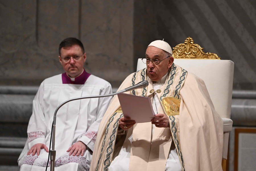 Pope Francis presides the Easter vigil as part of the Holy Week celebrations, at St Peter's Basilica in the Vatican on March 30, 2024. -- Pic: AFP