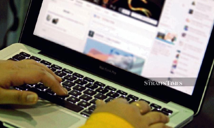  Some 1,100 social media content related to cyberbullying were taken down from Jan 1 to Nov 15 this year. - NSTP file pic