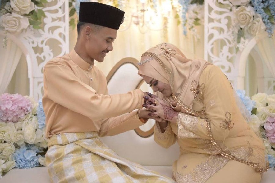 The 26-year age gap between Muhammad Danial Ahmad Ali and his teacher, Jamilah Mohd, did not stop them from falling in love and getting married. - Pic courtesy of Muhammad Danial Ahmad Ali