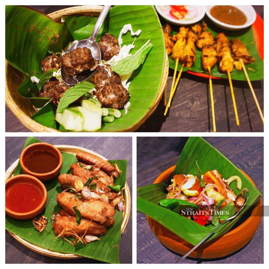 The side dishes: Clockwise from top - Hot and sour meatballs and chicken satay, Yum Kai Yang grilled spicy chicken and Kai Tawt deep-fried chicken wings.