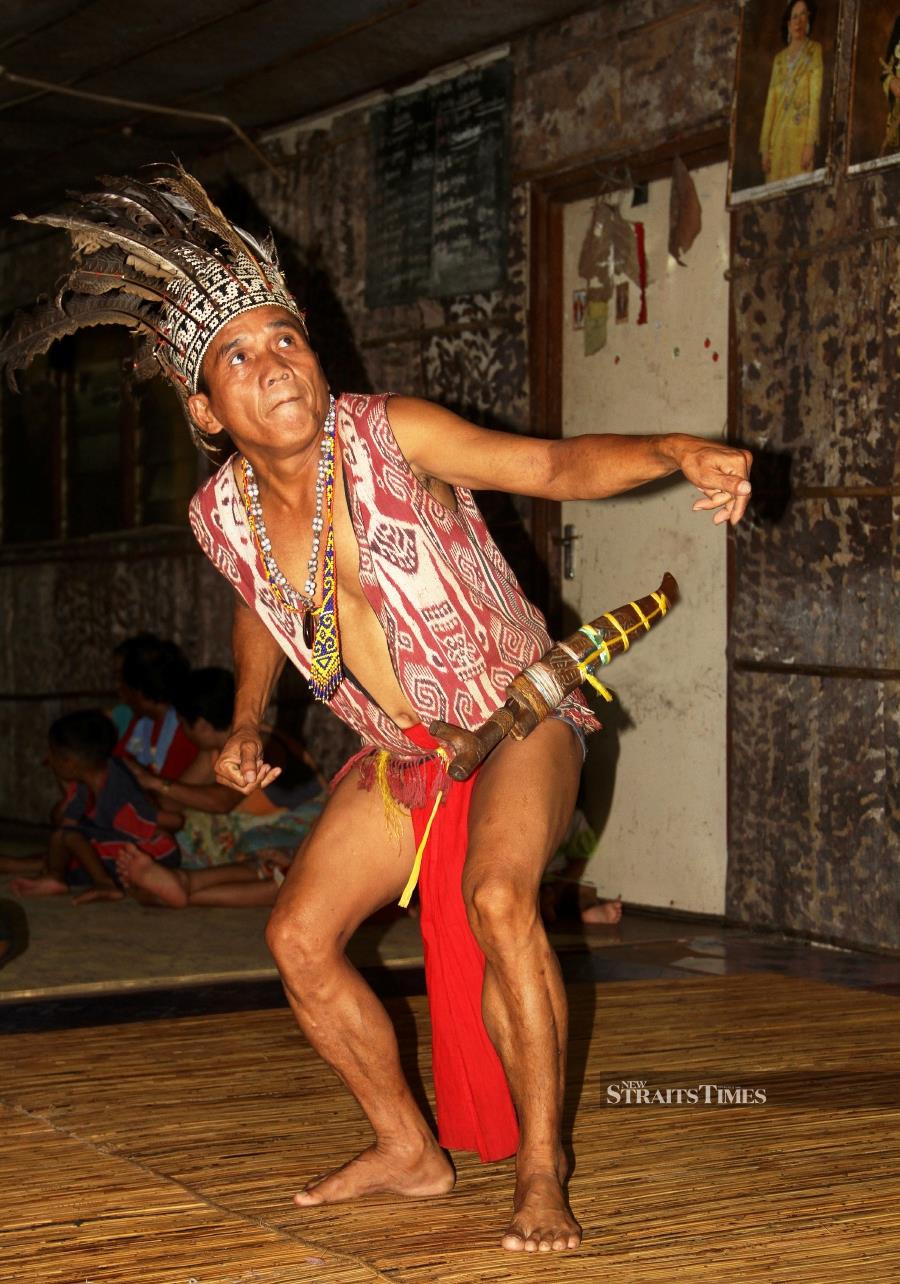 Dancing is an important part of Gawai at Ng Mengkak, Ulu Engkari Longhouse. Pictures by David Bowden.