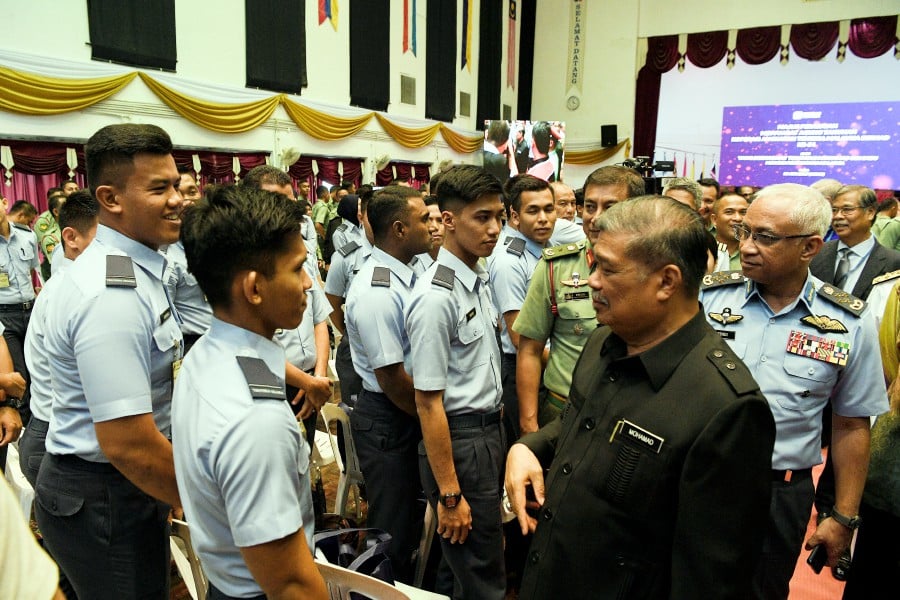 Defence Minister Mohamad Sabu (second from right) kanan) at the 54th annual general meeting of the Armed Forces Cooperative in Sungai Buloh today. -- Pix: BERNAMA 