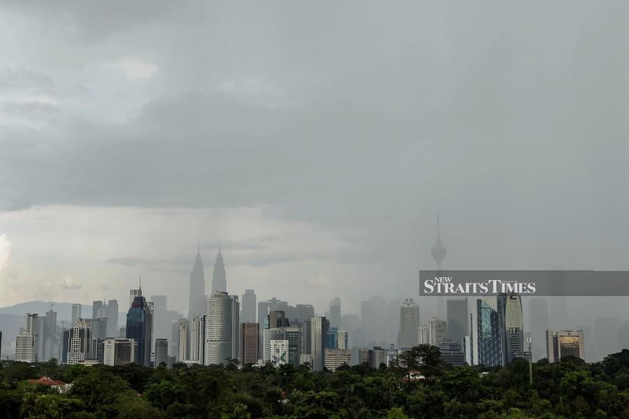 A general view of Kuala Lumpur’s skyscrapers, during wet weather recently. -NSTP/AIZUDDIN SAAD