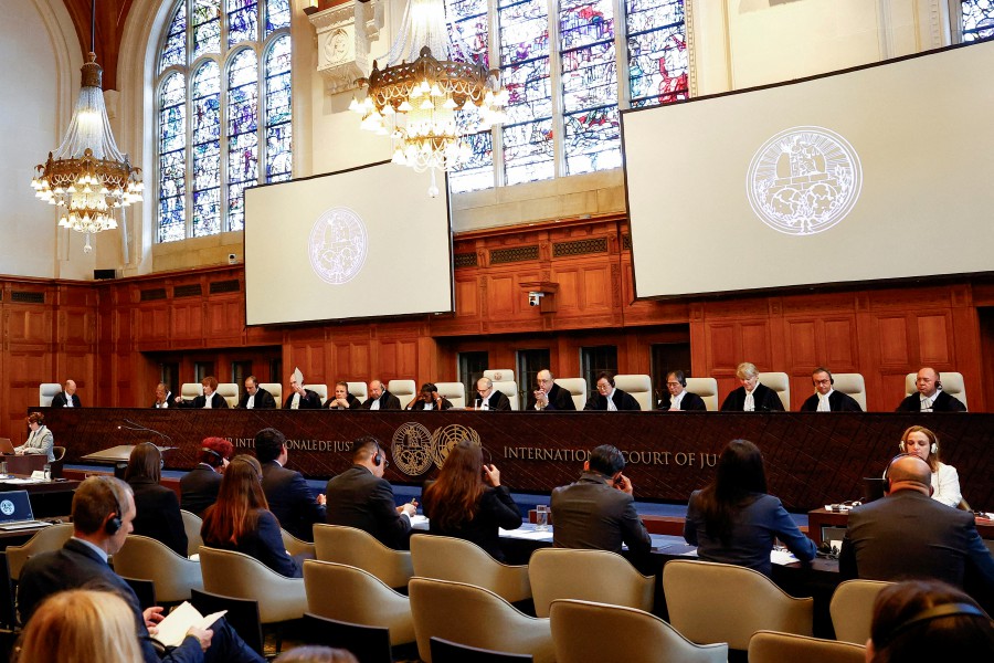 FILE PHOTO: Judges and delegates sit in the courtroom during a public hearing at the International Court of Justice (ICJ) in The Hague, Netherlands. --  REUTERS/File Photo