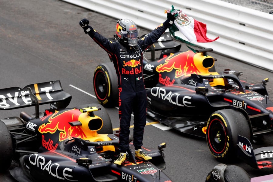 Red Bull's Sergio Perez celebrates after winning Monaco Grand Prix race. -- Pic: REUTERS