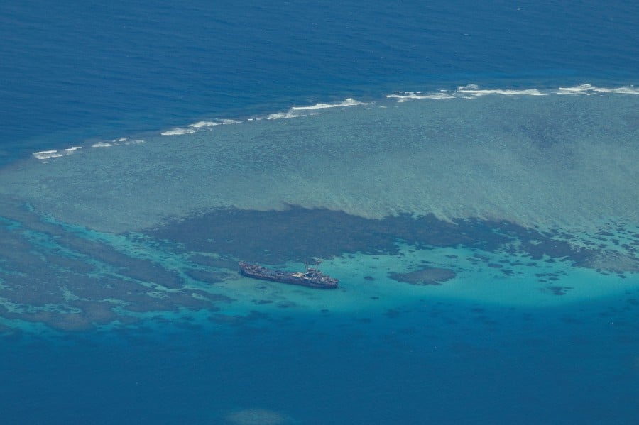 FILE PHOTO: An aerial view shows the BRP Sierra Madre on the contested Second Thomas Shoal, locally known as Ayungin, in the South China Sea, March 9, 2023. 