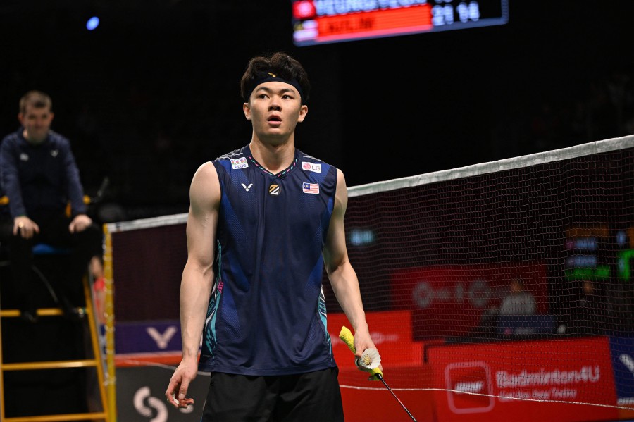 Malaysia's Lee Zii Jia celebrates after the semi-final match at the Australia Open badminton tournament in Sydney. -- AFP PIC