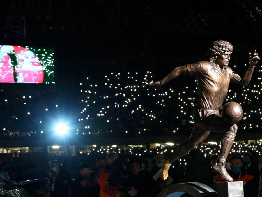  A statue depicting late Argentine soccer legend Diego Armando Maradona is seen during the presentation ceremony prior to the Italian Serie A match Napoli vs Lazio at the Diego Armando Maradona stadium in Naples, Italy. - EPA PIC