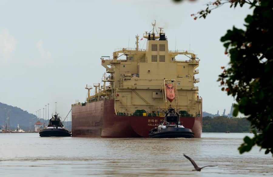 Liberian flagged Hallasan Explorer LPG tanker navigates at the Panama Canal, in Panama. The country on Jan 20 rejected President Donald Trump's pledge that the United States would be "taking back" the Panama Canal, saying the key interoceanic waterway would remain under its control. -- AFP PIC