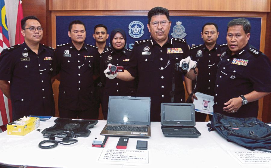 Kelantan cops nab man suspected of burgling 14 gov't 