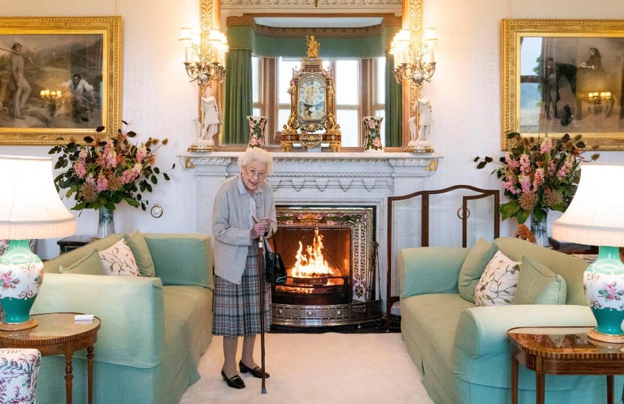 In this file photo taken on September 6, 2022 Britain's Queen Elizabeth II waits to meet with new Conservative Party leader and Britain's Prime Minister-elect at Balmoral Castle in Ballater, Scotland. - AFP PIC