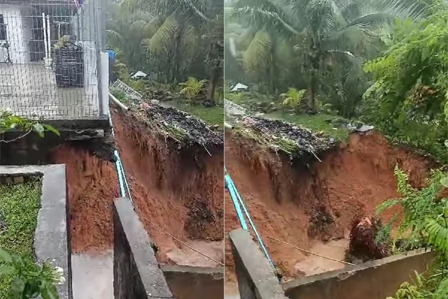 Residents were left in shock as heavy rain caused a drainage wall to suddenly collapse in Taman Sri Saujana here today. - Pic courtey from Tmn sri saujana, Kota Tinggi FB