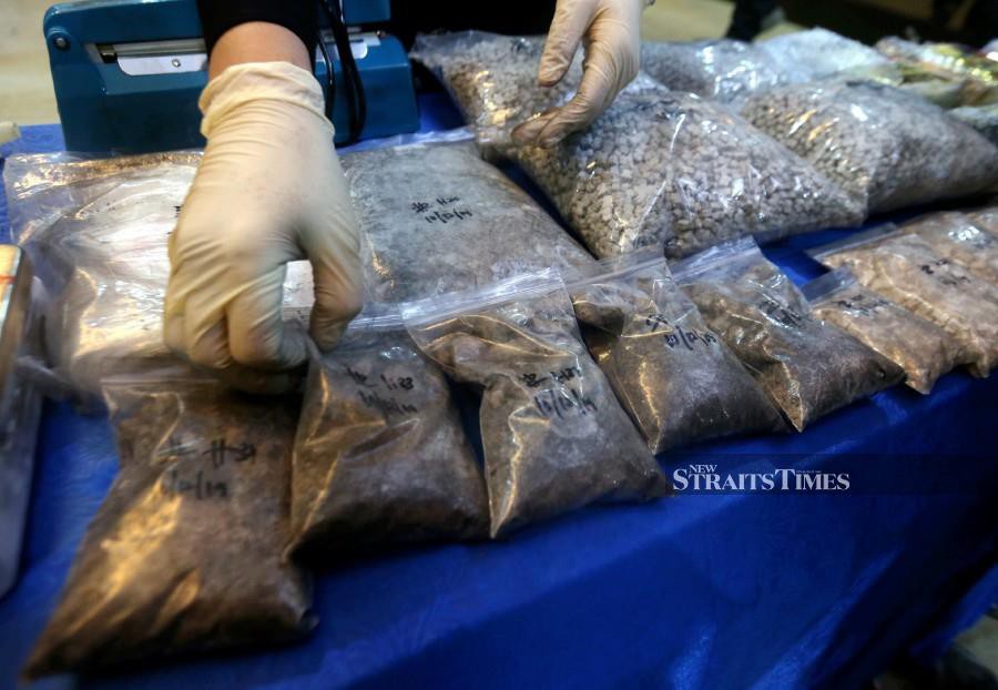 Some of the drugs seized by police during a raid in Petaling Jaya. -NSTP/Danial Saad