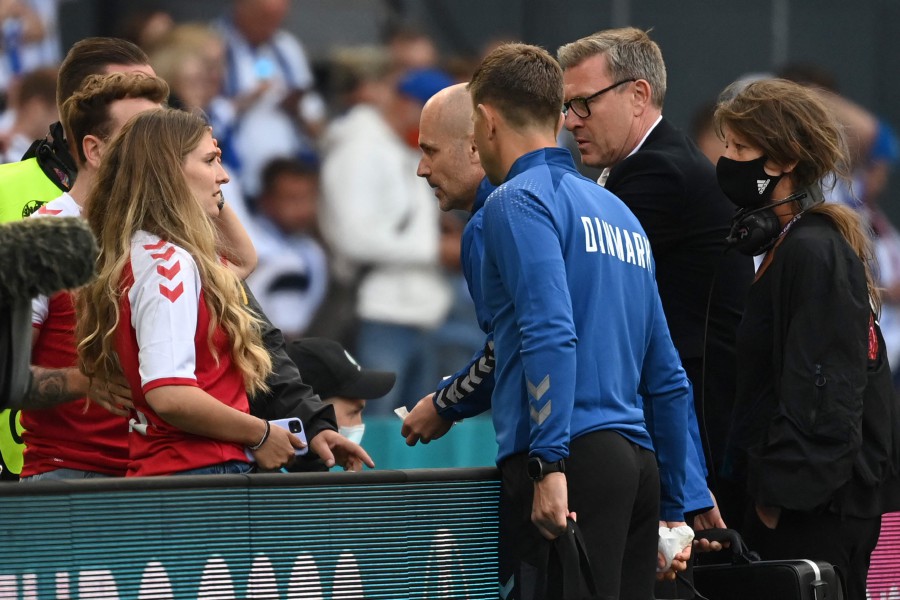 Sabrina Kvist Jensen (L), partner of Denmark's midfielder Christian Eriksen, reacts after Eriksen collapsed during the UEFA EURO 2020 Group B football match between Denmark and Finland at the Parken Stadium in Copenhagen. -AFP Pic