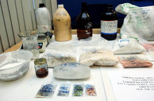 A mini syabu laboratory in-the-making was raided by police in Taman Panchong Mutiara and a couple, aged 51 and 28 was arrested along with drugs weighing in at more than five kilogrammes which is estimated to be worth around RM200,000. Pix by ZULAIKHA ZAINUZMAN