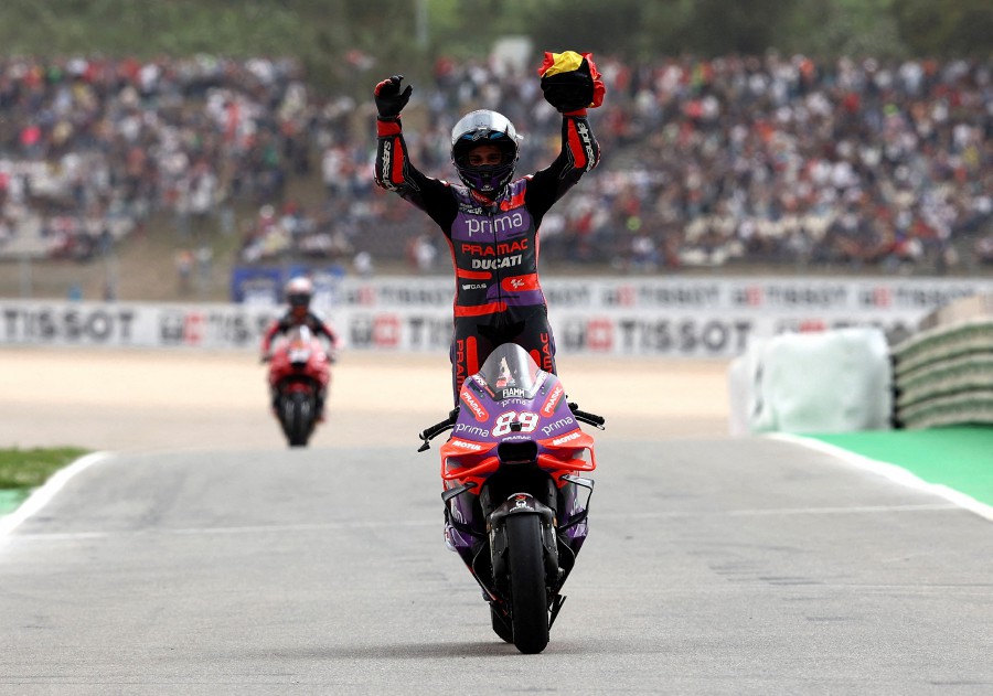 Prima Pramac Racing's Jorge Martin celebrates after winning the race. -- REUTERS