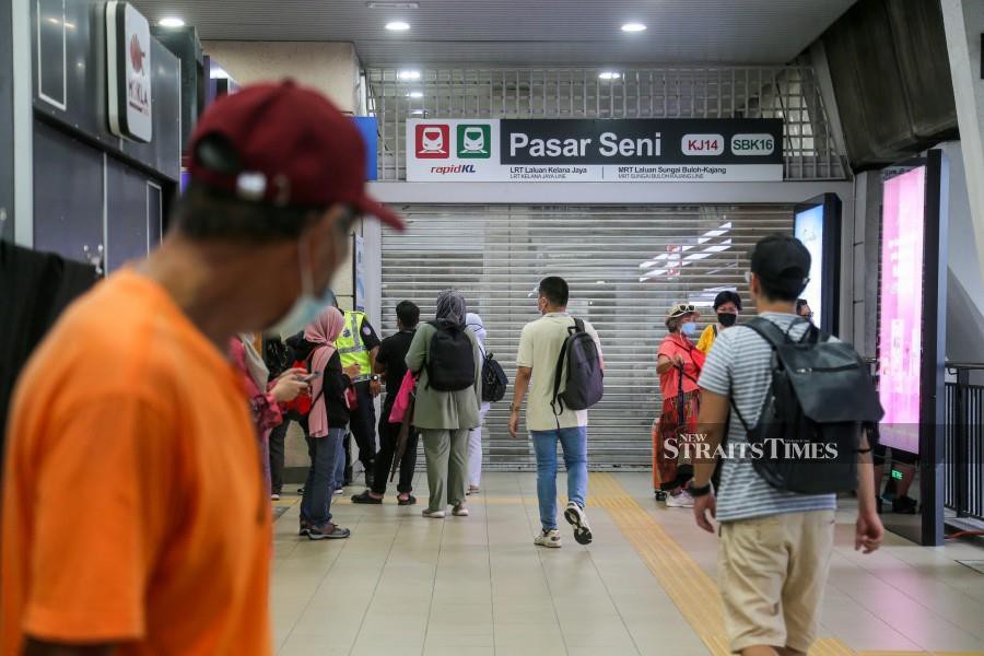 Commuters seen arriving early at the LRT Pasar Seni station to avoid the crowd. -NSTP/ASWADI ALIAS.