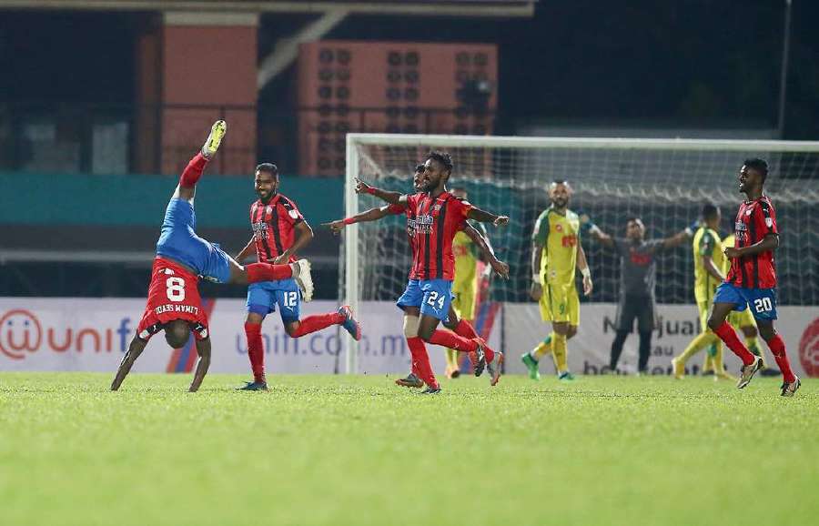 MIFA player, L'Imam Seydi (left) celebrates his first goal against Kedah in the 2018 Malaysian Cup at the Petaling Jaya City Council Stadium. (NSTP / NUR ADIBAH AHMAD IZAM)