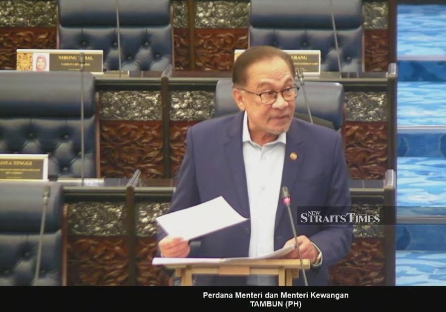 Prime Minister Datuk Seri Anwar Ibrahim speaking during the Dewan Rakyat sitting today. 