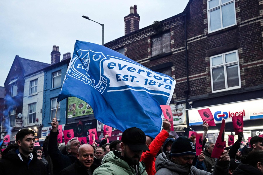  Everton's supporters protest over the club 10-point punishment for breaching financial regulation in the streets, prior to the English Premier League football match between Everton and Manchester United at Goodison Park in Liverpool, north west England on November 26, 2023.-AFP PIC