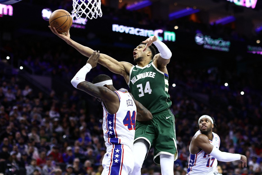 Giannis Antetokounmpo of the Milwaukee Bucks shoots a lay up past Paul Reed of the Philadelphia 76ers during the third quarter at the Wells Fargo Center in Philadelphia, Pennsylvania. -AFP PIC